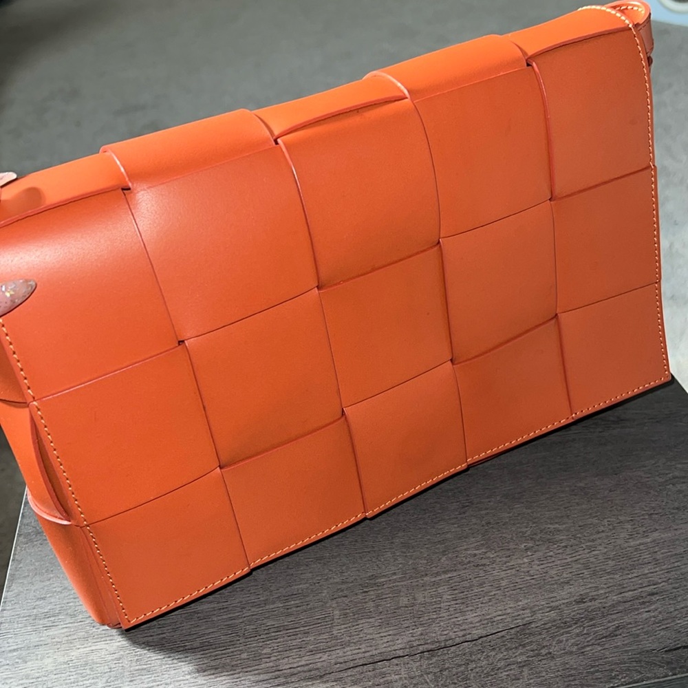 Orange weave crossbody bag